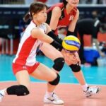 What is the rally point system in volleyball and the old side-out system?