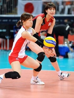 What should I do if I get underballed in volleyball and my arm hurts due to internal bleeding?